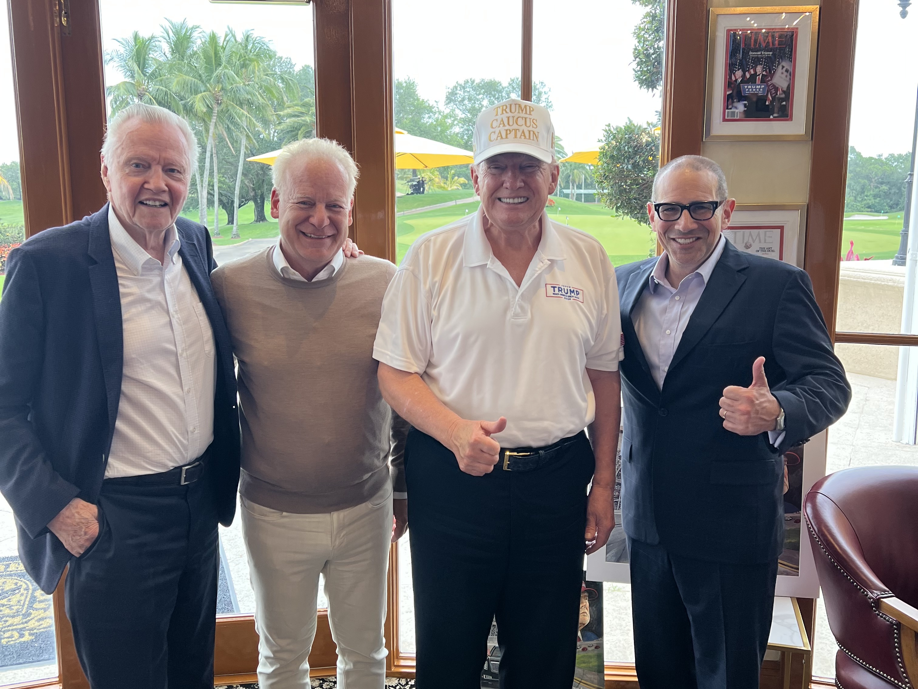 caption: Actor Jon Voight, his advisor and CEO of SP Media Group Steven Paul, President Trump, and SP Media Group/Atlas Comics president Scott Karol met at Mar-a-Lago over the weekend.