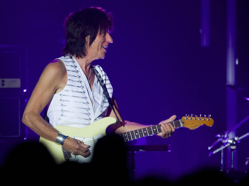 caption: Guitarist Jeff Beck performs during the 43rd Montreux Jazz Festival. The influential guitarist died on January 10, 2023 after contracting bacterial meningitis.