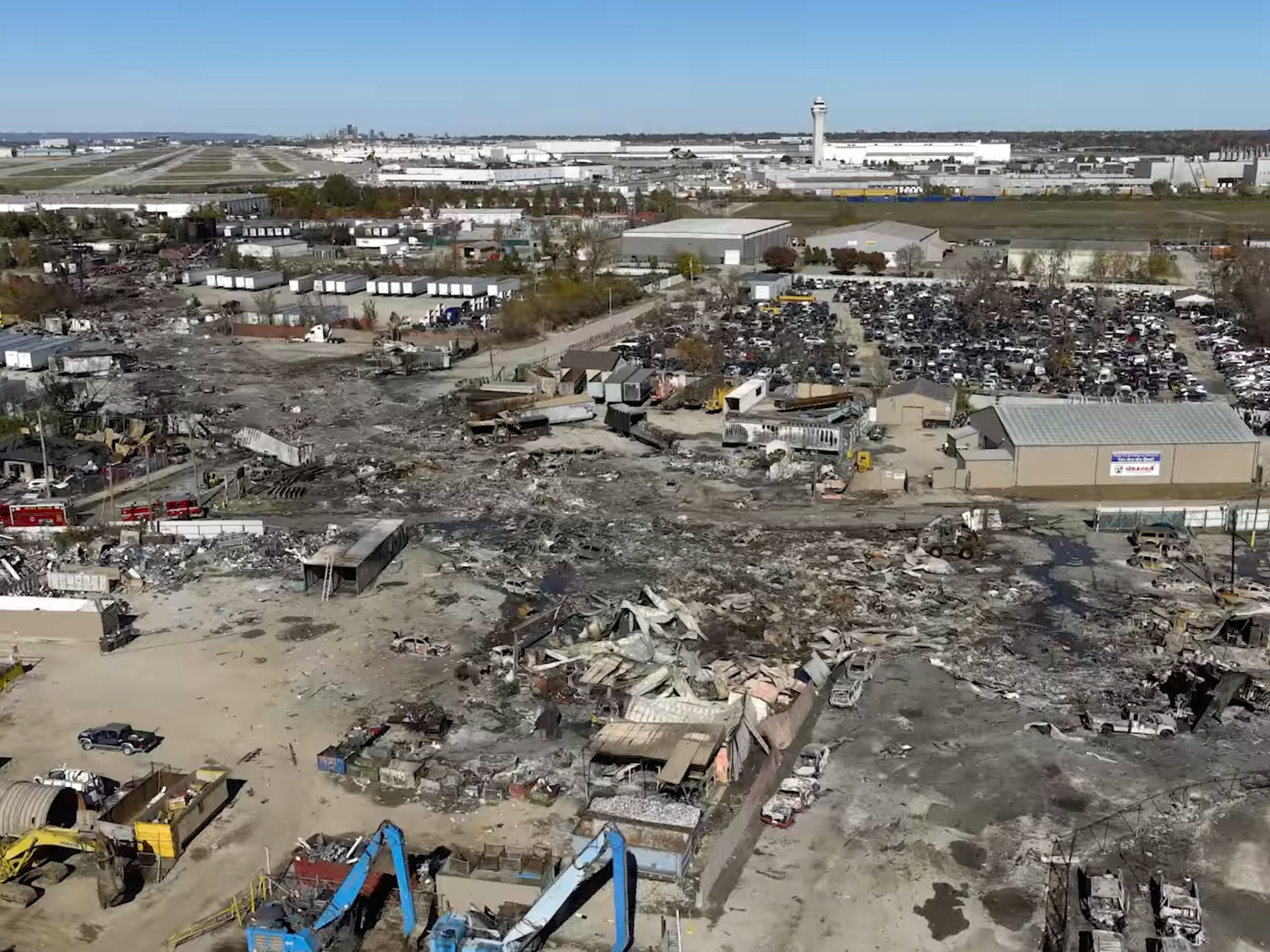 caption: This photo provided by the National Transportation Safety Board shows UPS plane crash scene on Thursday, in Louisville, Ky.