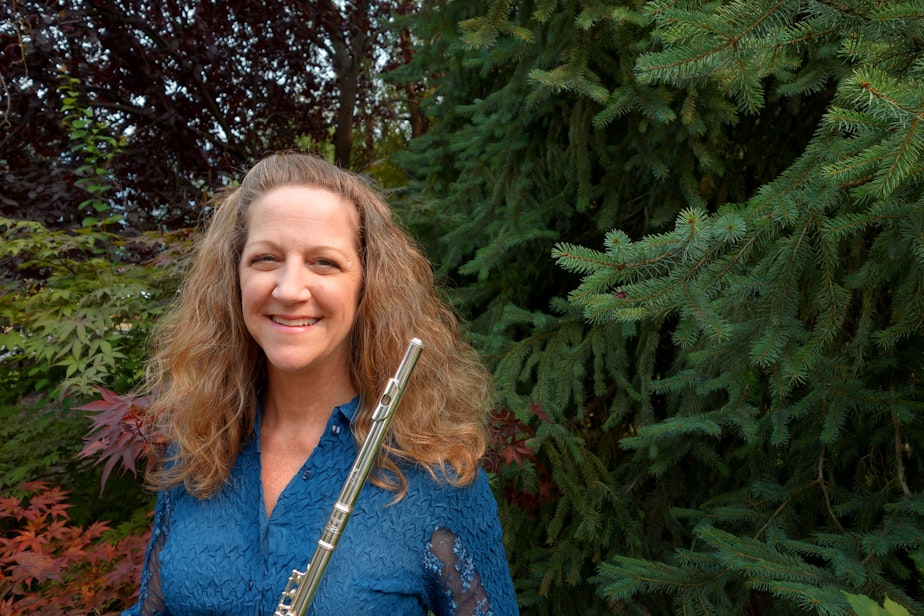 caption: Christine Walsh began playing flute in high school. She now plays for the Boeing Company Employee Band.
