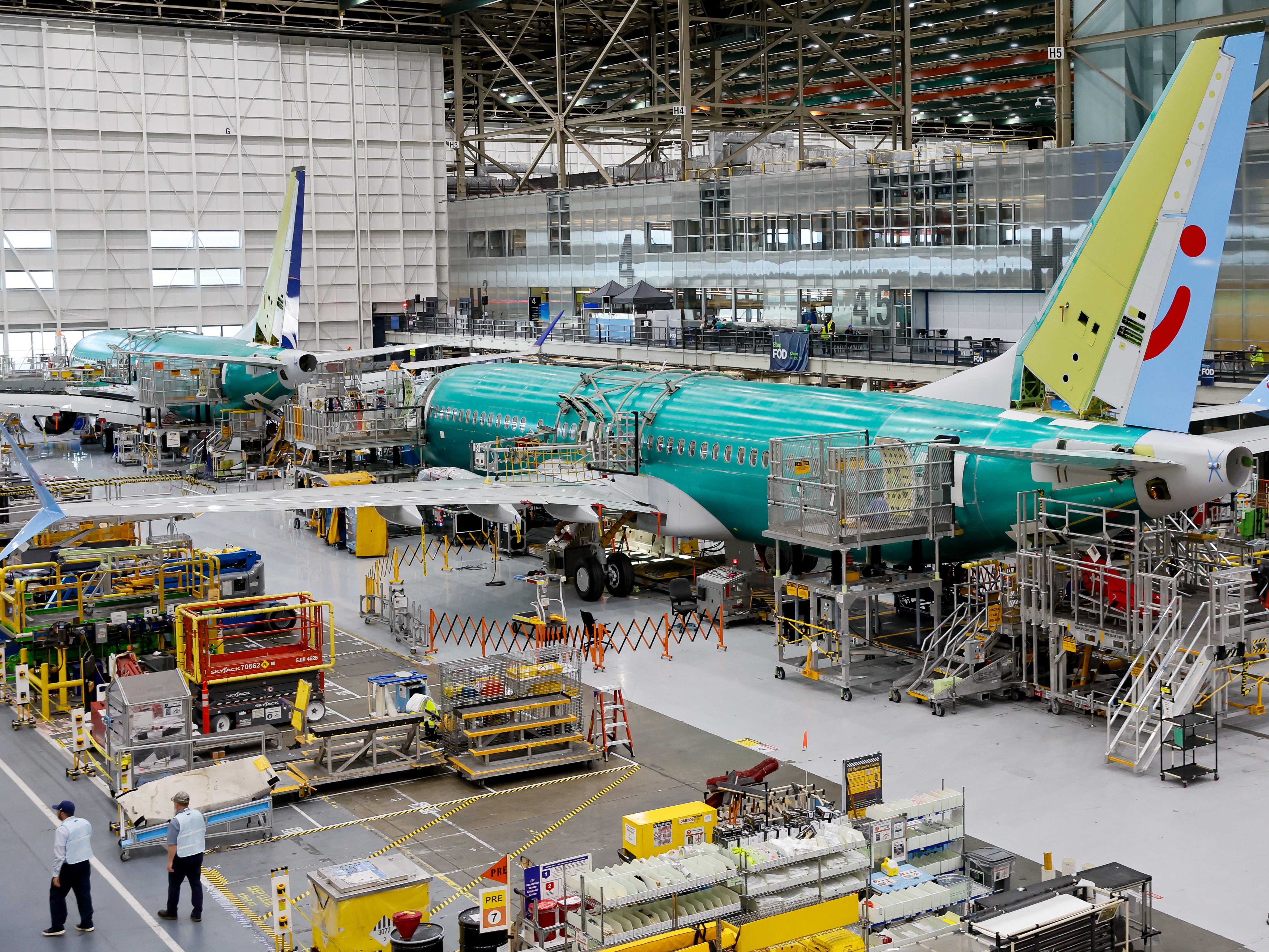 caption: The U.S. Justice Department says Boeing has agreed to plead guilty to a criminal fraud charge stemming from the crashes of two 737 Max jets in 2018 and 2019. Boeing assembles its 737s at its factory in Renton, Wash.
