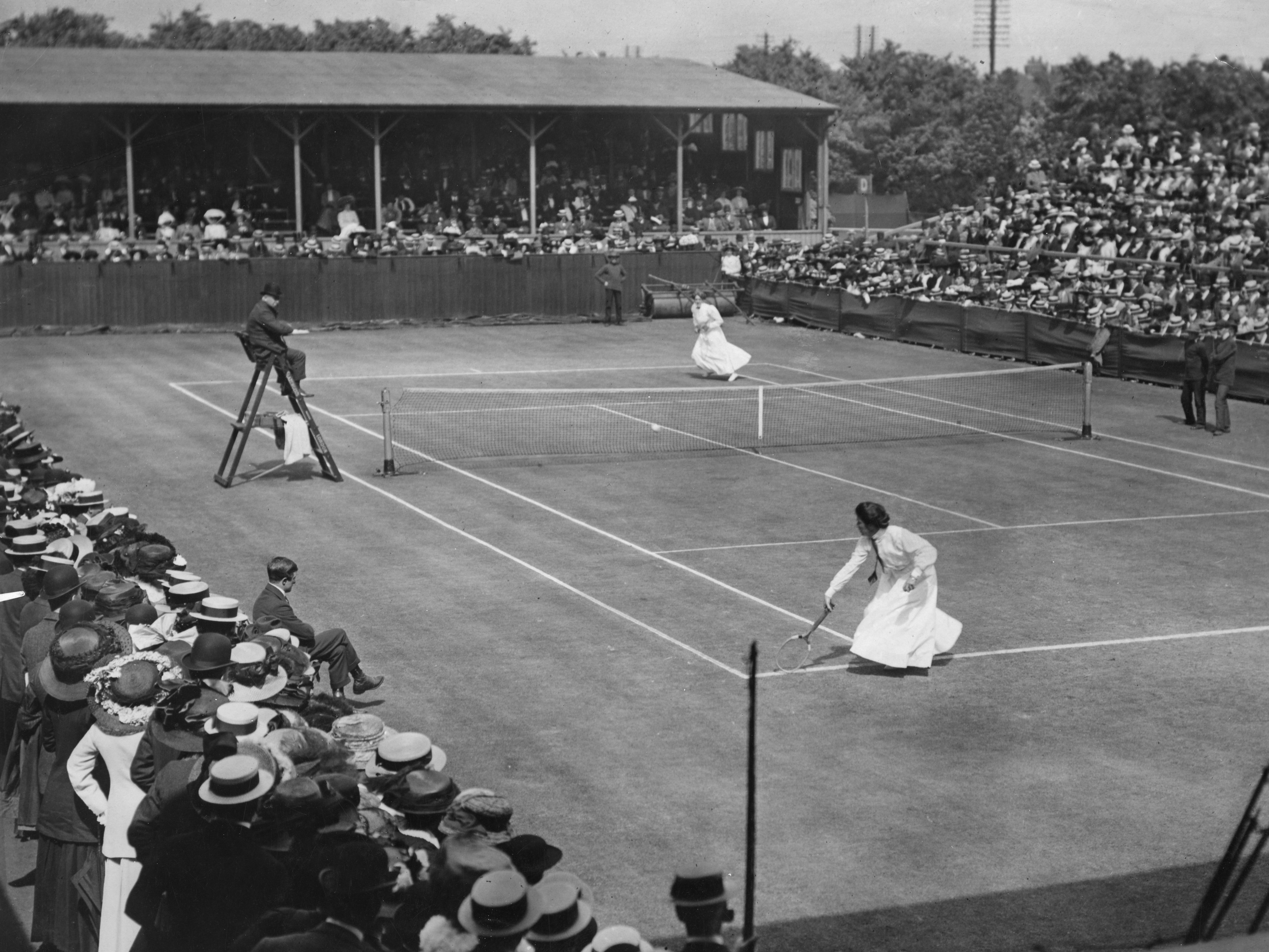 caption: Edith Johnson and Dorothea Lambert Chambers face off in the 1910 Wimbledon tournament in London. Lawn tennis — the game we know today — started in the late 19th century but has its roots in a medieval sport.