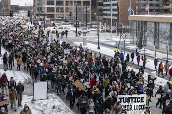 caption: The killing of Amir Locke has brought protesters back to the streets in Minneapolis, where George Floyd was murdered by police less than two years ago.