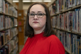 caption: School librarian Amanda Jones endured harassment and threats after speaking out in defense of a diverse selection of books in the public libraries of Livingston Parish, La.
