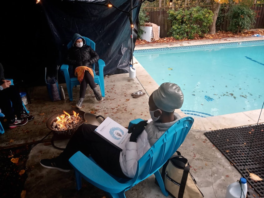 caption: Students and instructor of the Orca Swim School