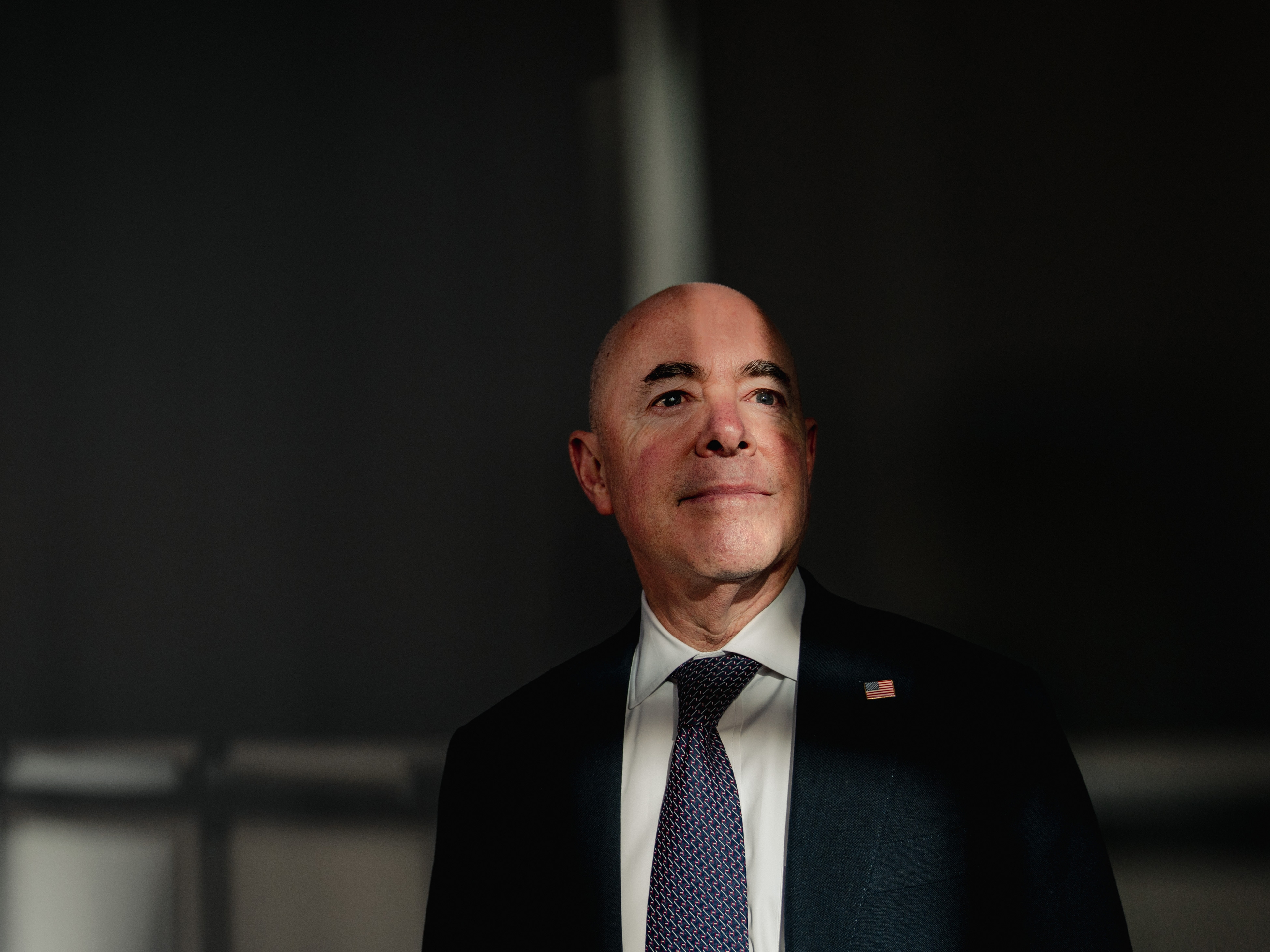 caption: U.S. Secretary of Homeland Security Alejandro Mayorkas poses for a portrait at NPR Headquarters in Washington, DC, on Jan. 7.