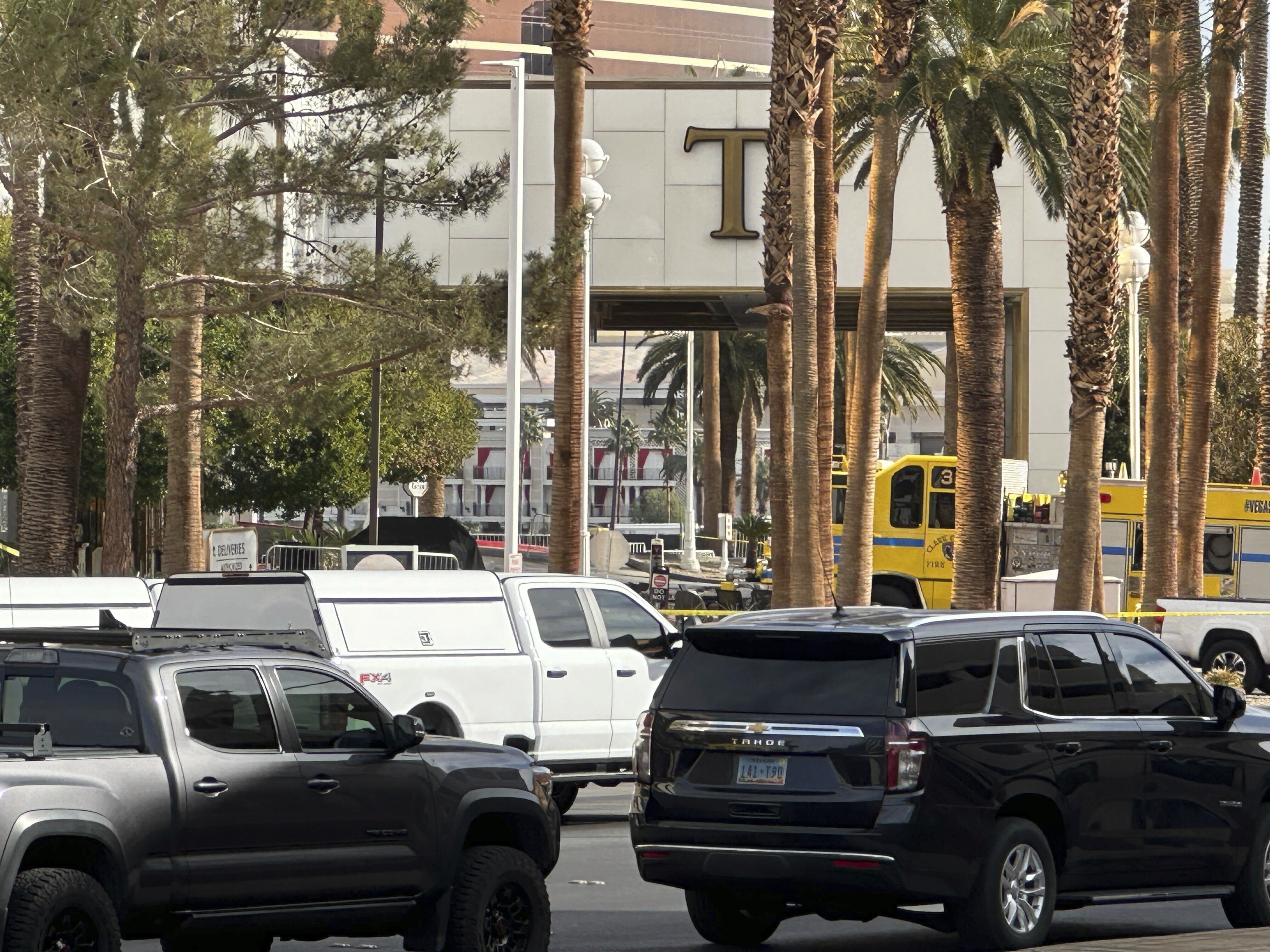 caption: Police block the area after a vehicle caught fire and exploded outside the lobby of President-elect Donald Trump's hotel on Wednesday, Jan. 1, 2025.