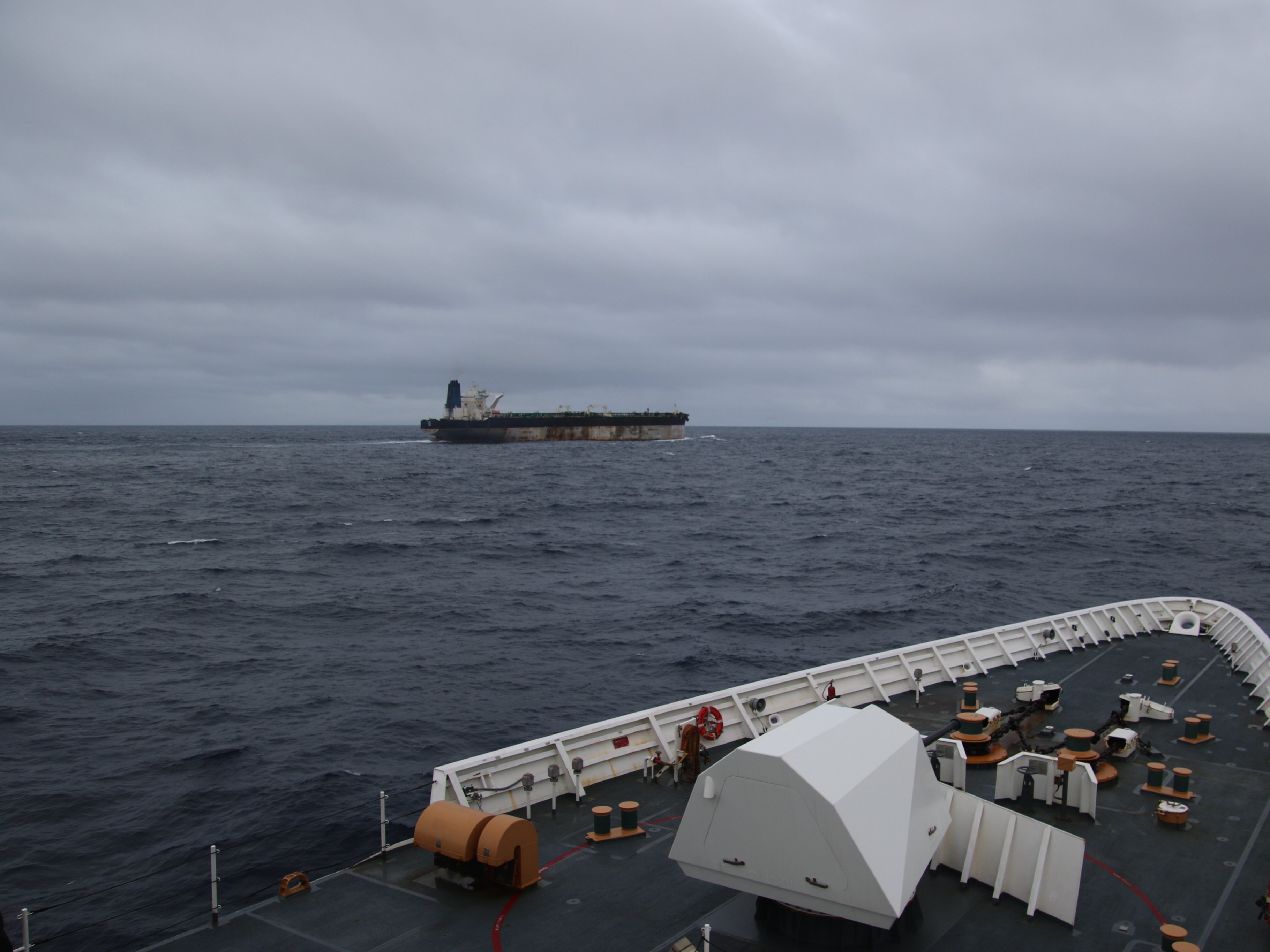caption: A crude oil tanker named the Bella 1 and later the Marinera was seized by U.S. forces on Wednesday. The tanker is seen here in a photo taken aboard the U.S. Coast Guard Cutter Munro.