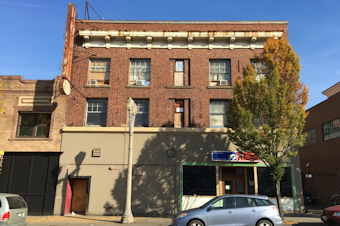 caption: The Merkle Hotel in Tacoma, as seen in October 2018. 