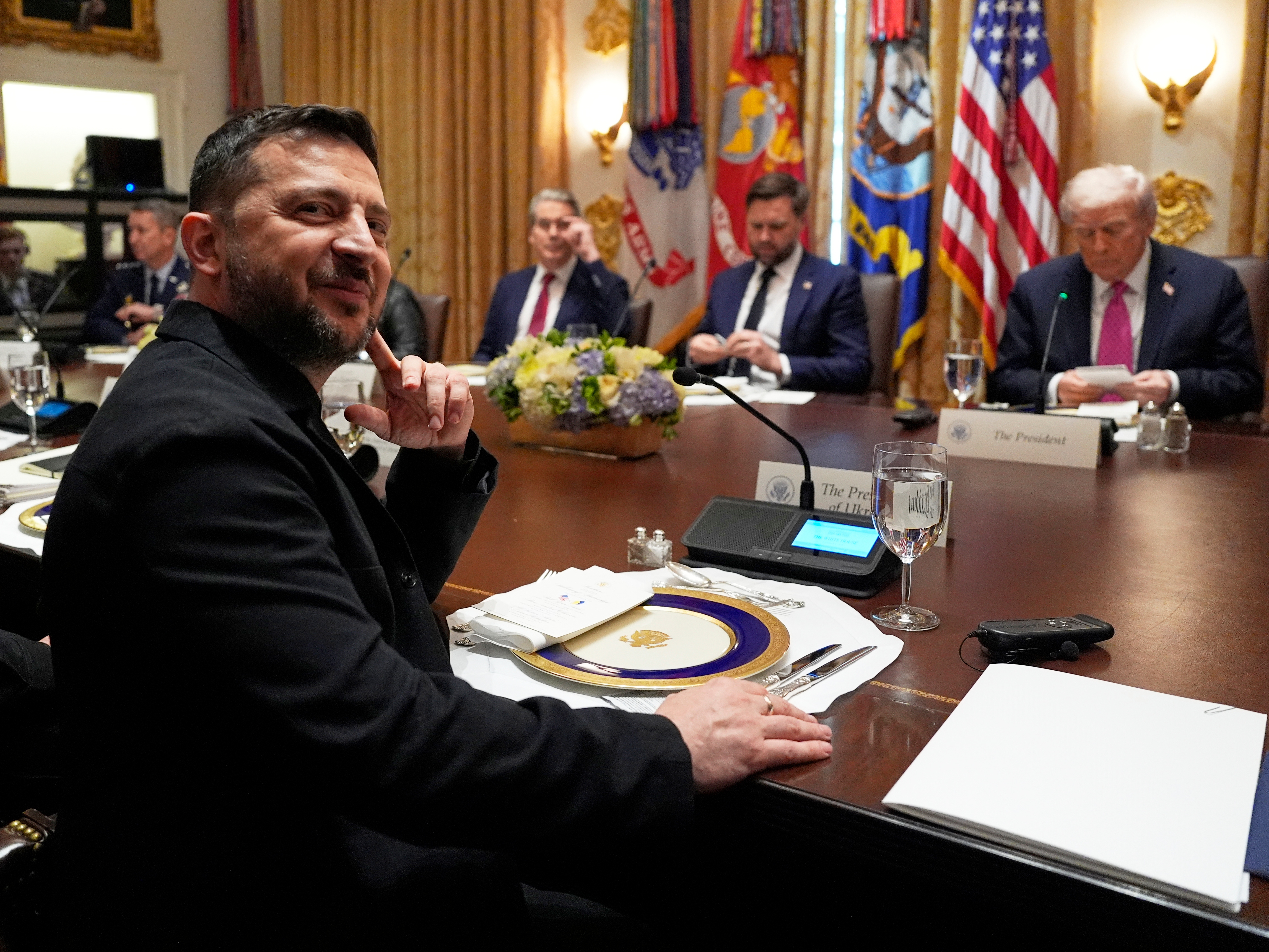 caption: Ukraine's President Volodymyr Zelenskyy, left, sits before a meeting with President Donald Trump, from right, Vice President JD Vance and Treasury Secretary Scott Bessent in the Cabinet Room of the White House, Friday, Oct. 17, 2025, in Washington.