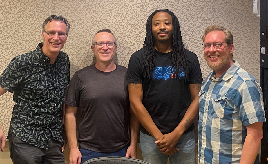 caption: Bill Radke discusses the week’s news with Seattle Times Patrick Malone, Wild West newsletter author Eli Sanders, and KUOW’s Mike Davis.