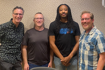 caption: Bill Radke discusses the week’s news with Seattle Times Patrick Malone, Wild West newsletter author Eli Sanders, and KUOW’s Mike Davis.
