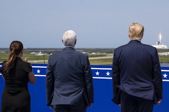 caption: President Trump, Vice President Pence and Karen Pence view the SpaceX flight to the International Space Station at Kennedy Space Center, Saturday in Cape Canaveral, Fla.