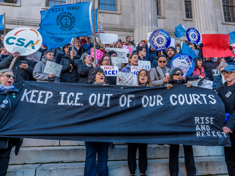 caption: The Association of Legal Aid Attorneys along with dozens of unions, immigrant rights organizations, and community groups held a rally on December 7, 2017 at Brooklyn Borough Hall to call on the Office of Court Administration and Chief Judge Janet DiFiore to prohibit Immigration & Customs Enforcement agents from entering state courthouses, and to end coordination with ICE.CREDIT: Pacific Press/LightRocket via Getty Images