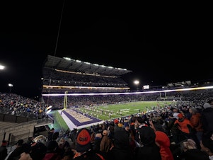 caption: University of Washington faces off against Oregon State University in a November 2022 game. 