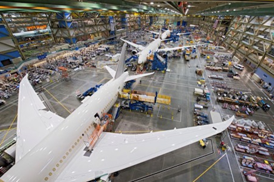 caption: The production line at a Boeing facility.