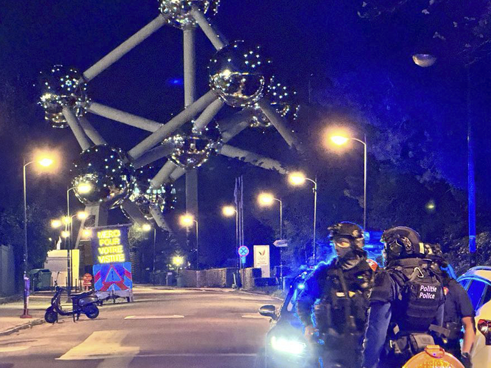 caption: Police patrol outside the King Baudouin Stadium, after a match between Belgium and Sweden was suspended, after a shooting in the center of Brussels, Monday, Oct. 16, 2023.