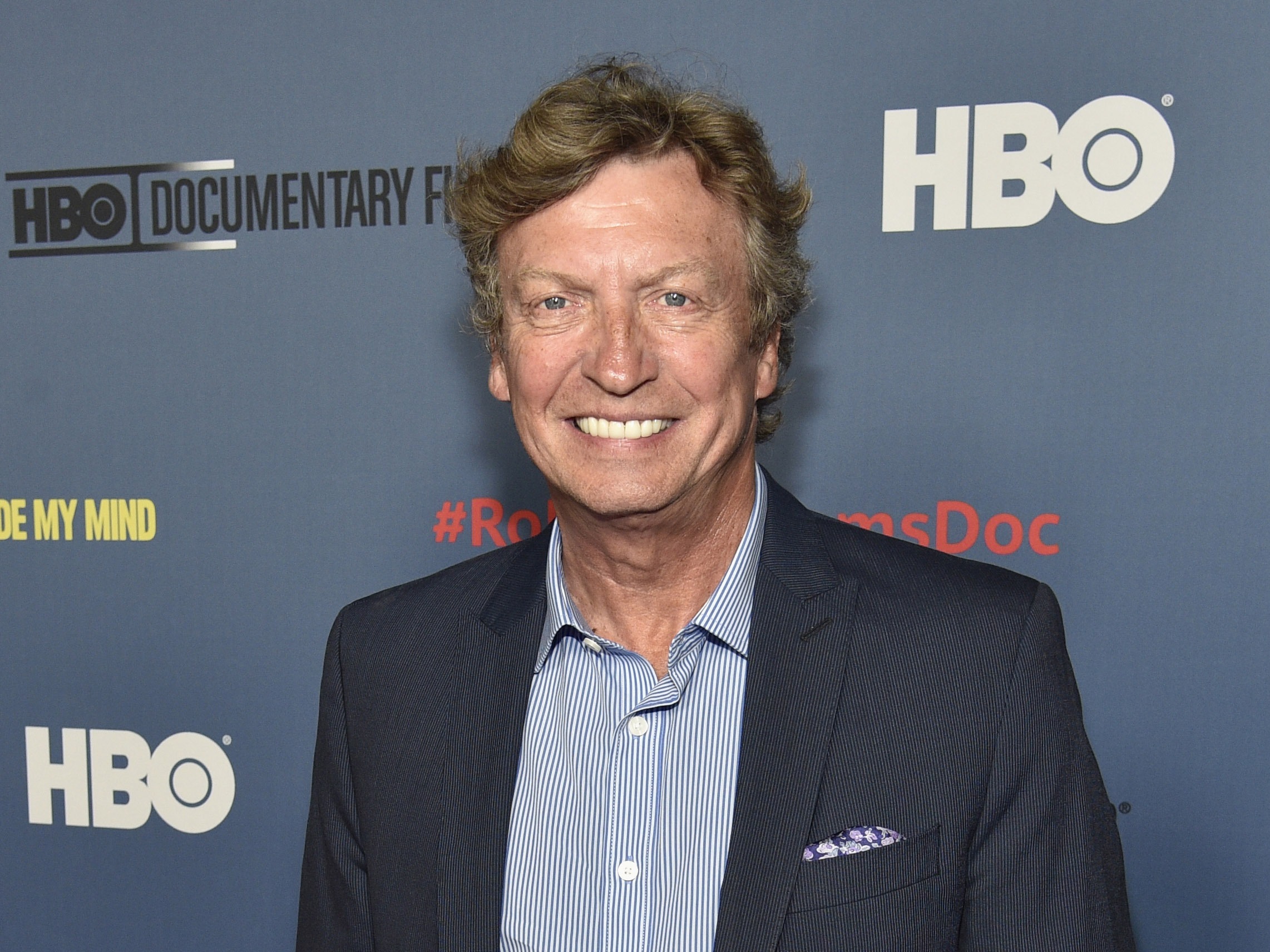 caption: Nigel Lythgoe arrives at the Los Angeles premiere of "Robin Williams: Come Inside My Mind" on June 27, 2018.