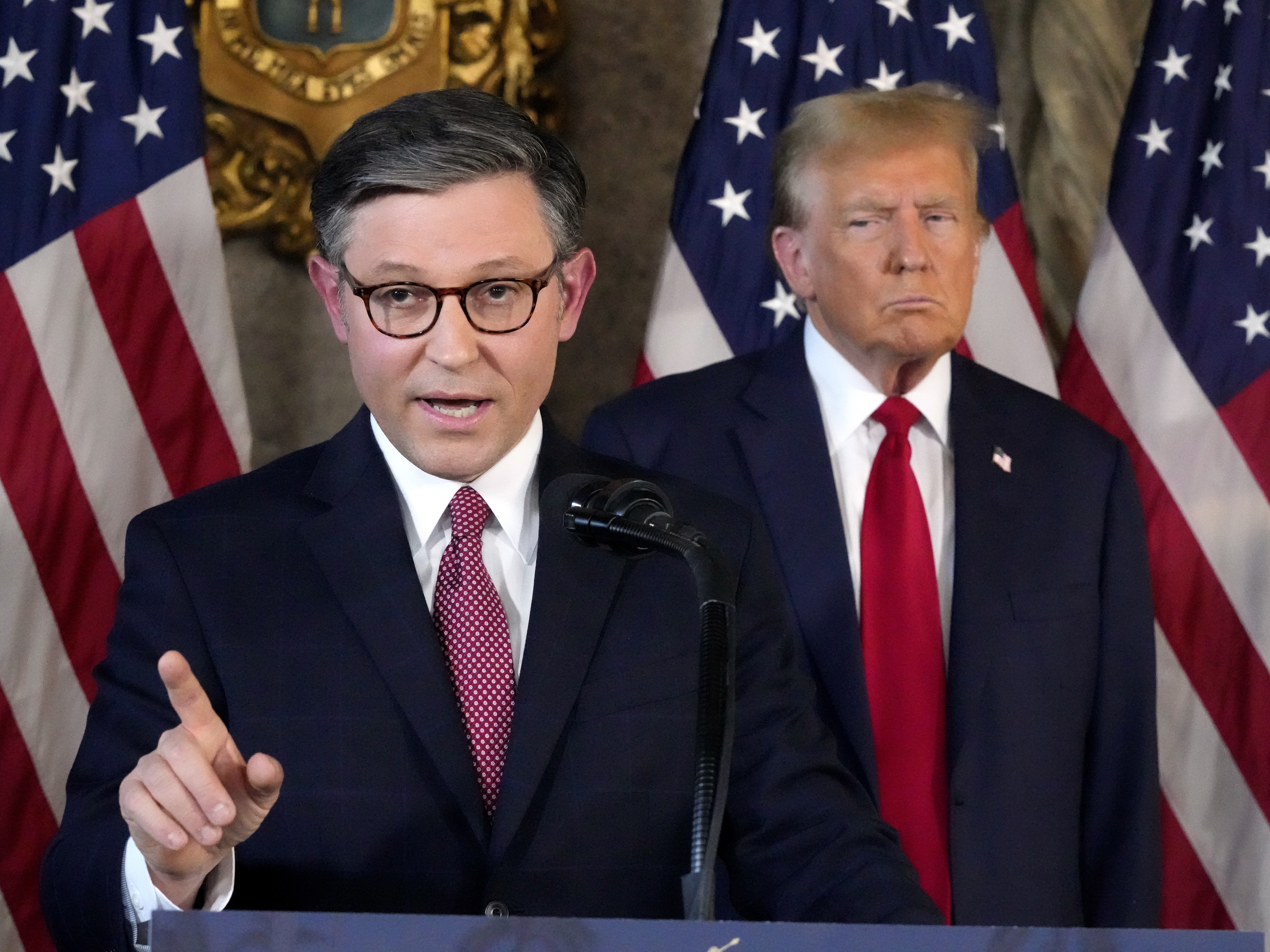 caption: Speaker of the House Mike Johnson, R-La., speaks as former President Donald Trump listens during a news conference, April 12, 2024, at Mar-a-Lago in Palm Beach, Fla. Johnson promised recently that if they gain control in Congress, Republicans' agenda includes "massive reform" of the Affordable Care Act.