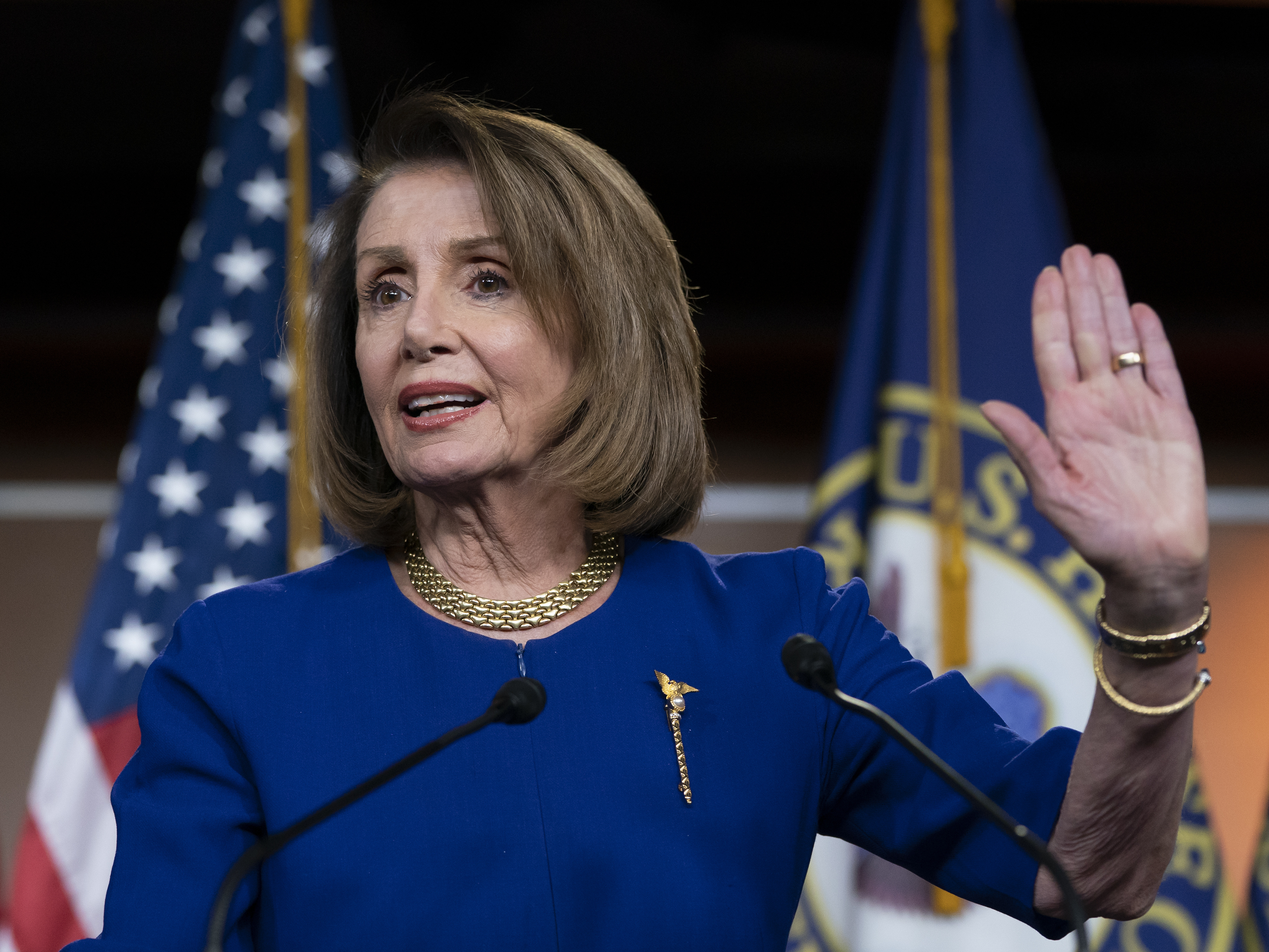 caption: House Speaker Nancy Pelosi, D-Calif., talks with reporters during her weekly news conference in Washington, D.C.
