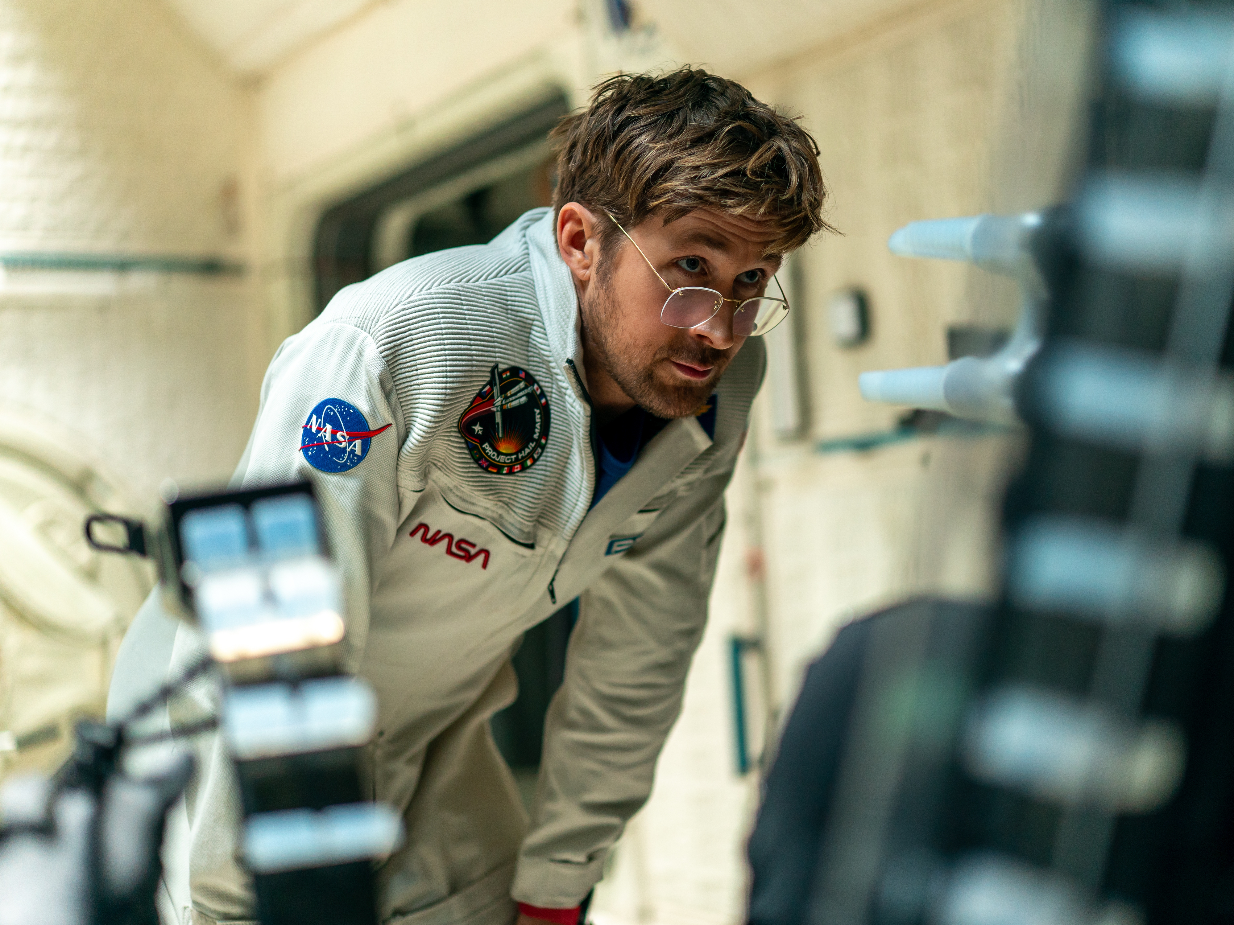 caption: In the film <em>Project Hail Mary</em>, middle school teacher Ryland Grace (played by Ryan Gosling) goes on a interstellar journey and conducts lab science in space in a quest to save humanity.