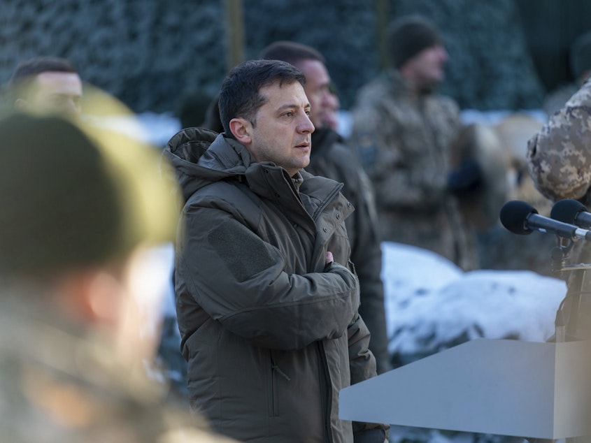 caption: Ukrainian President Volodymyr Zelenskiy visits a military unit in Ukraine's Donetsk region on Friday.