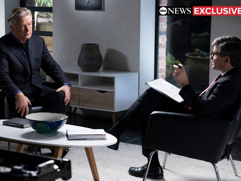 caption: Alec Baldwin and anchor George Stephanopoulos talk during the ABC News special <em>Alec Baldwin Unscripted</em>.