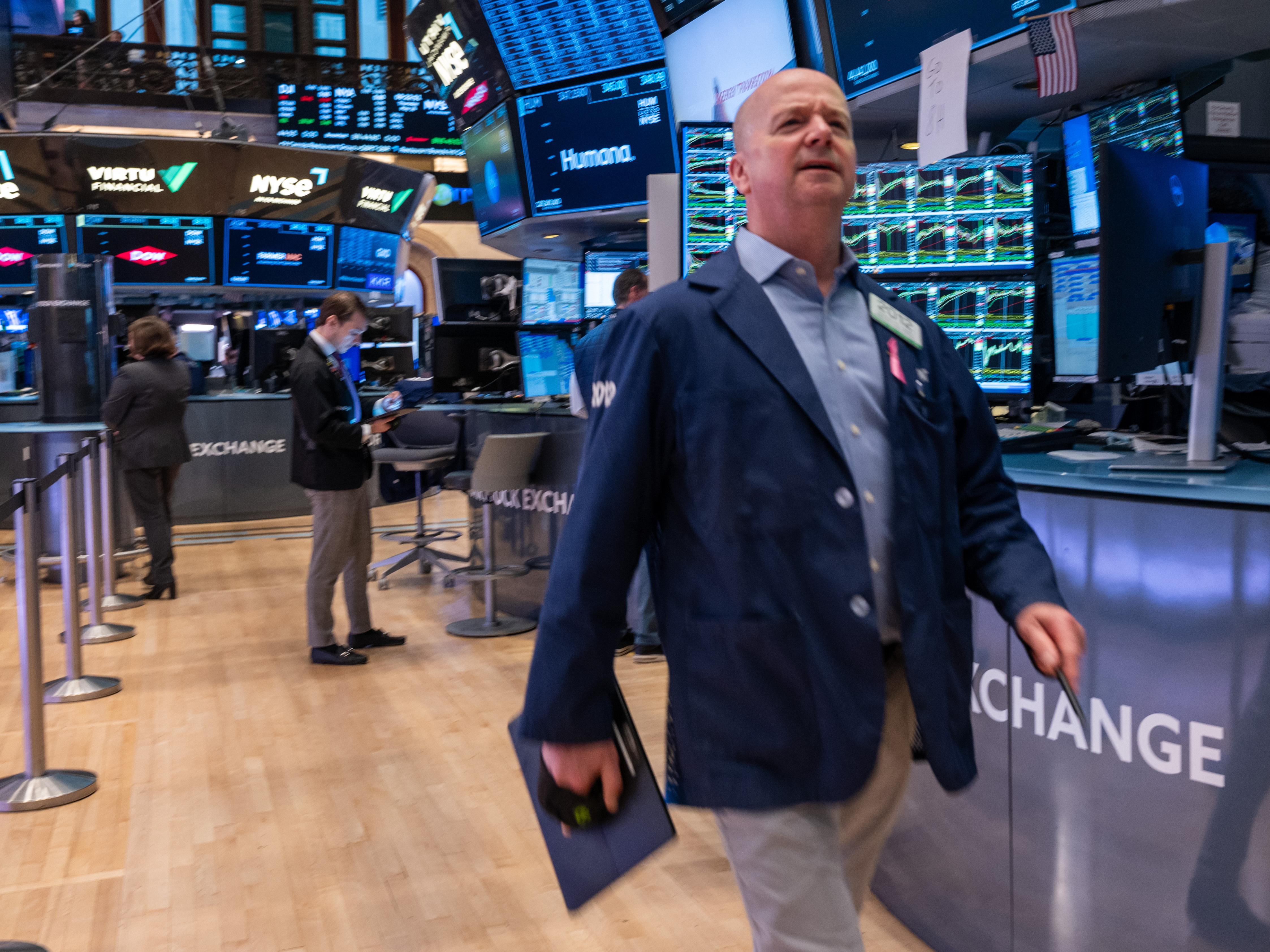 caption: Traders on the floor of the New York Stock Exchange in New York City on May 16, 2024, when the Dow hit 40,000 points for the first time ever.