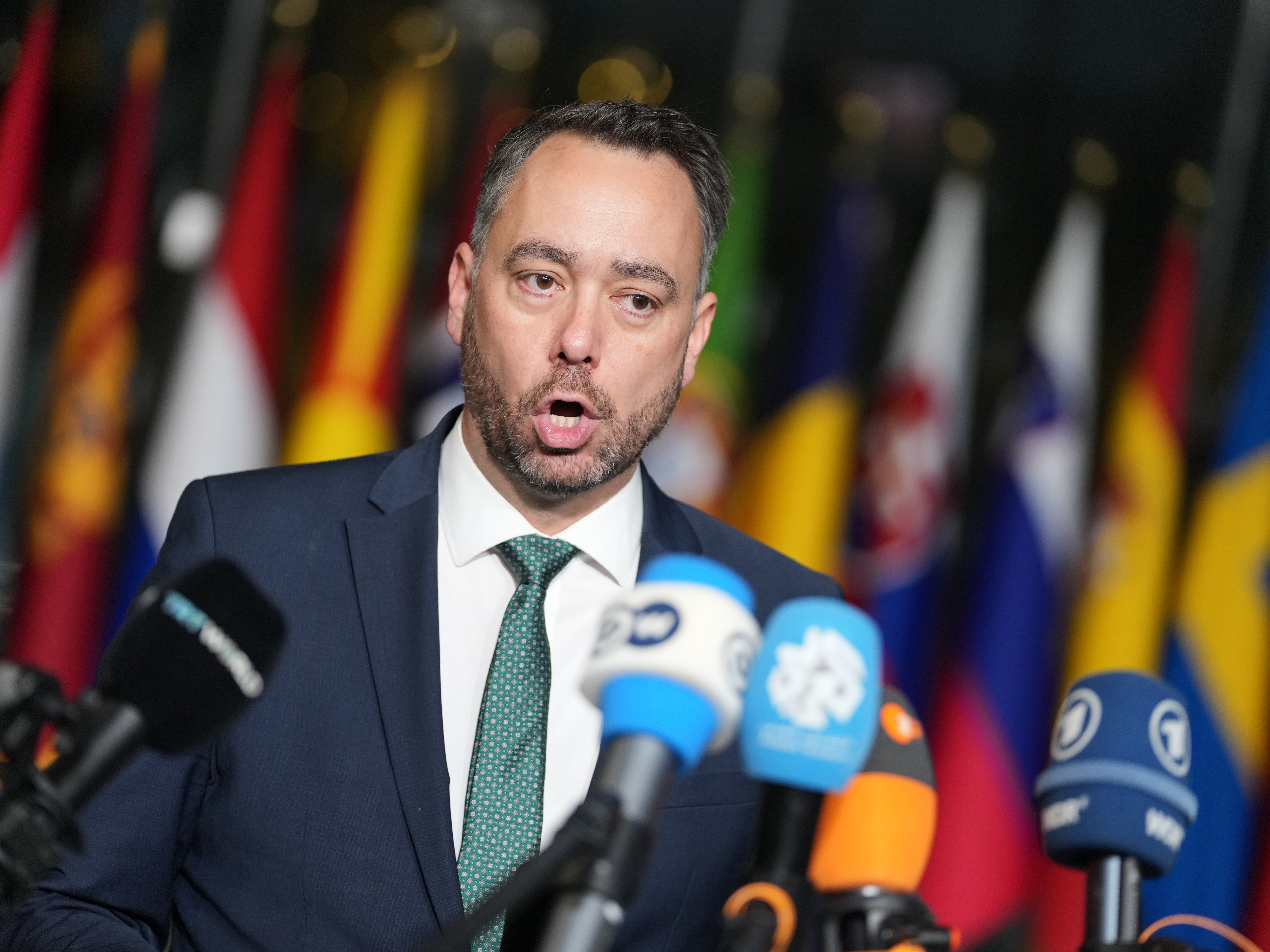 caption: Belgium's Foreign Minister Maxime Prevot speaks with the media as he arrives for a meeting of NATO foreign ministers at NATO headquarters in Brussels, on Wednesday.