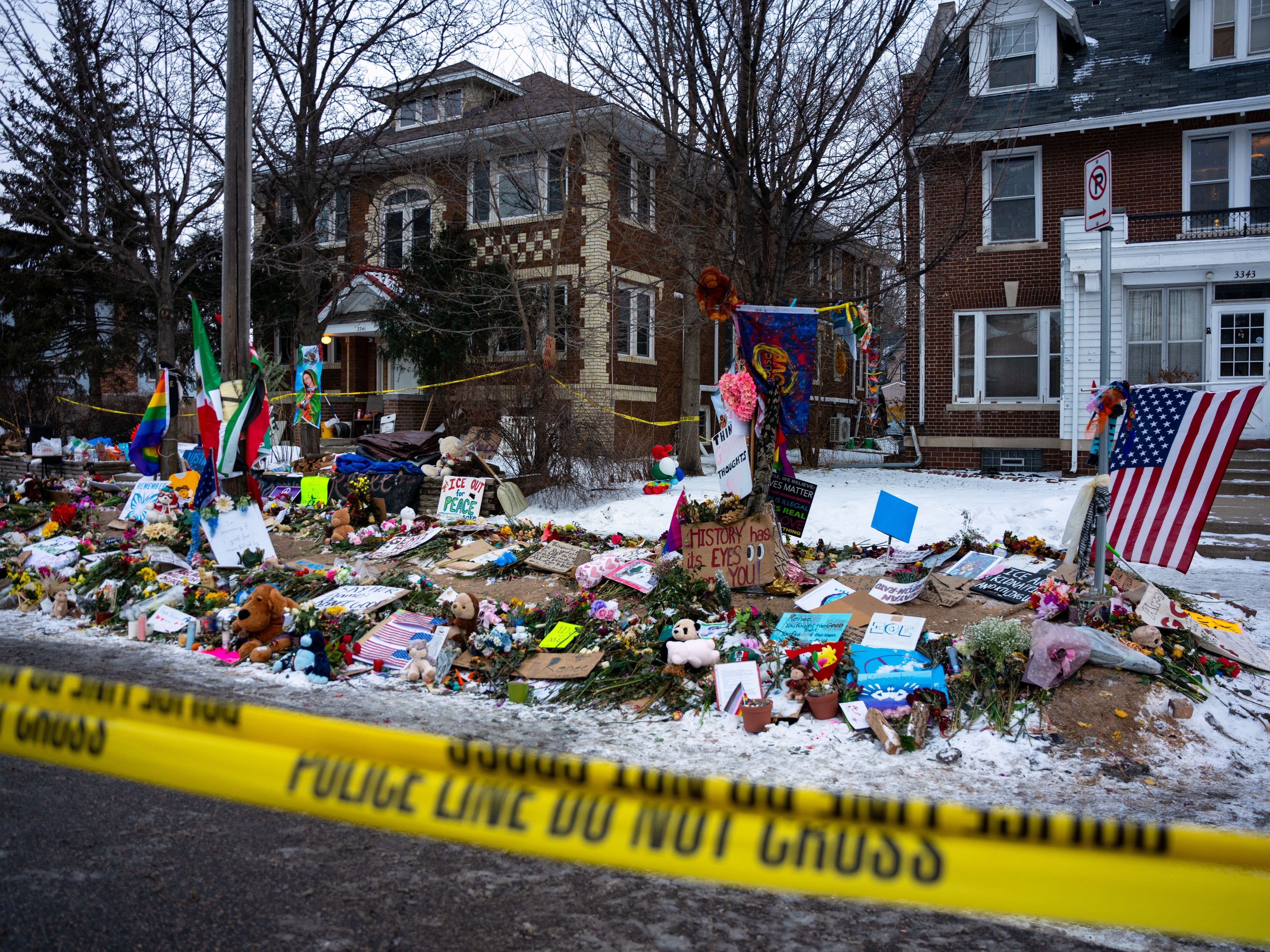 caption: A makeshift memorial for Renee Good, who was fatally shot by an ICE officer on Jan. 7, is seen on Jan. 20, in Minneapolis.