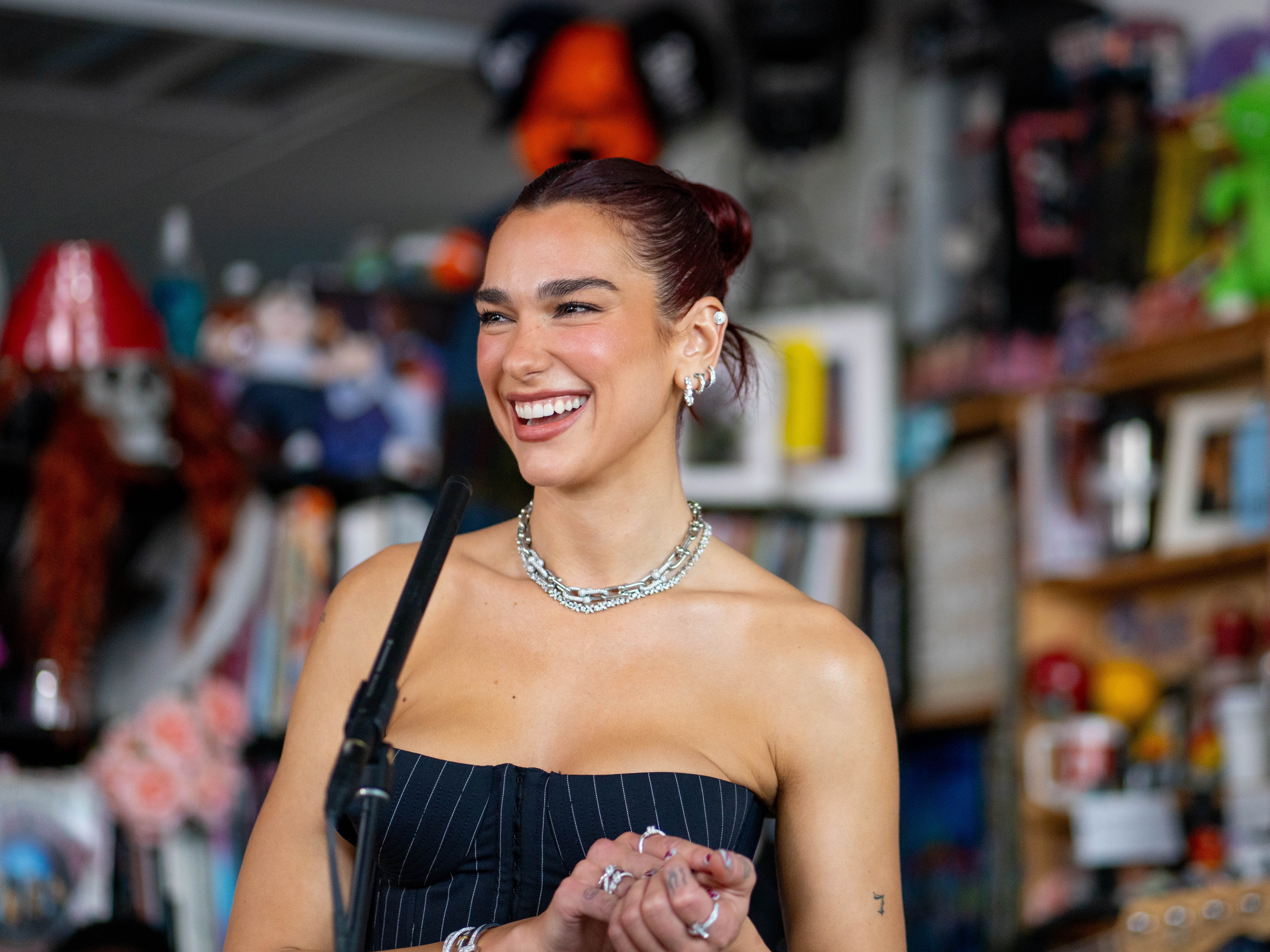 caption: <a href="https://www.npr.org/2024/10/25/g-s1-27259/dua-lipa-tiny-desk-concert">Dua Lipa</a>