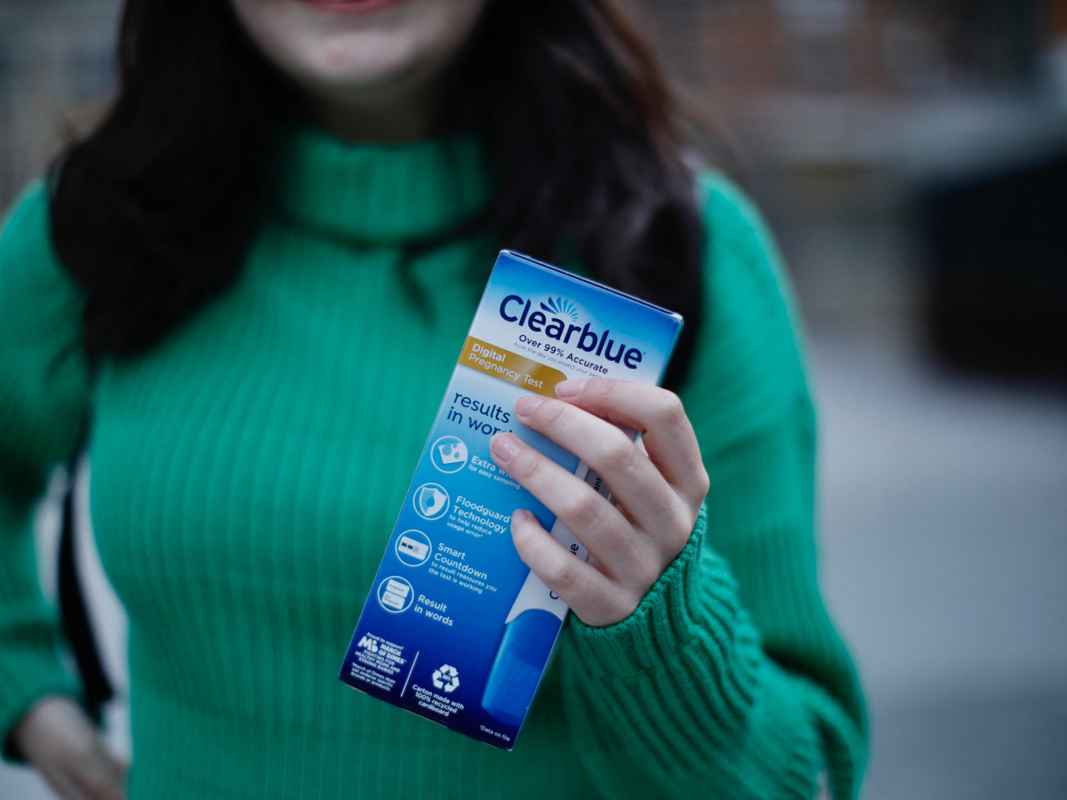 caption: A woman at an abortion-rights protest in New York in 2023 holds a pregnancy test. The U.S. teen pregnancy rate in 2025 was 11.7 births per 1,000 females ages 15 to 19, according to provisional data released by the Centers for Disease Control and Prevention on Thursday.