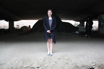 caption: Kara Bernstine, who is homeless, said the Jungle homeless encampment felt safer than other places in the city. The Jungle, a greenbelt under Interstate 5, will be completely cleared out this week.