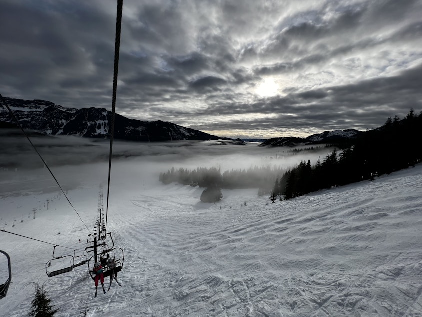 caption: The Summit at Snoqualmie ski resort as seen from a chair lift.