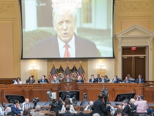 caption: A video of former President Donald Trump from his Jan. 6 Rose Garden statement is played as Cassidy Hutchinson, a former top aide to White House Chief of Staff Mark Meadows, testifies during the sixth hearing held by the House select committee investigating the Capitol insurrection on Tuesday, June 28, 2022.