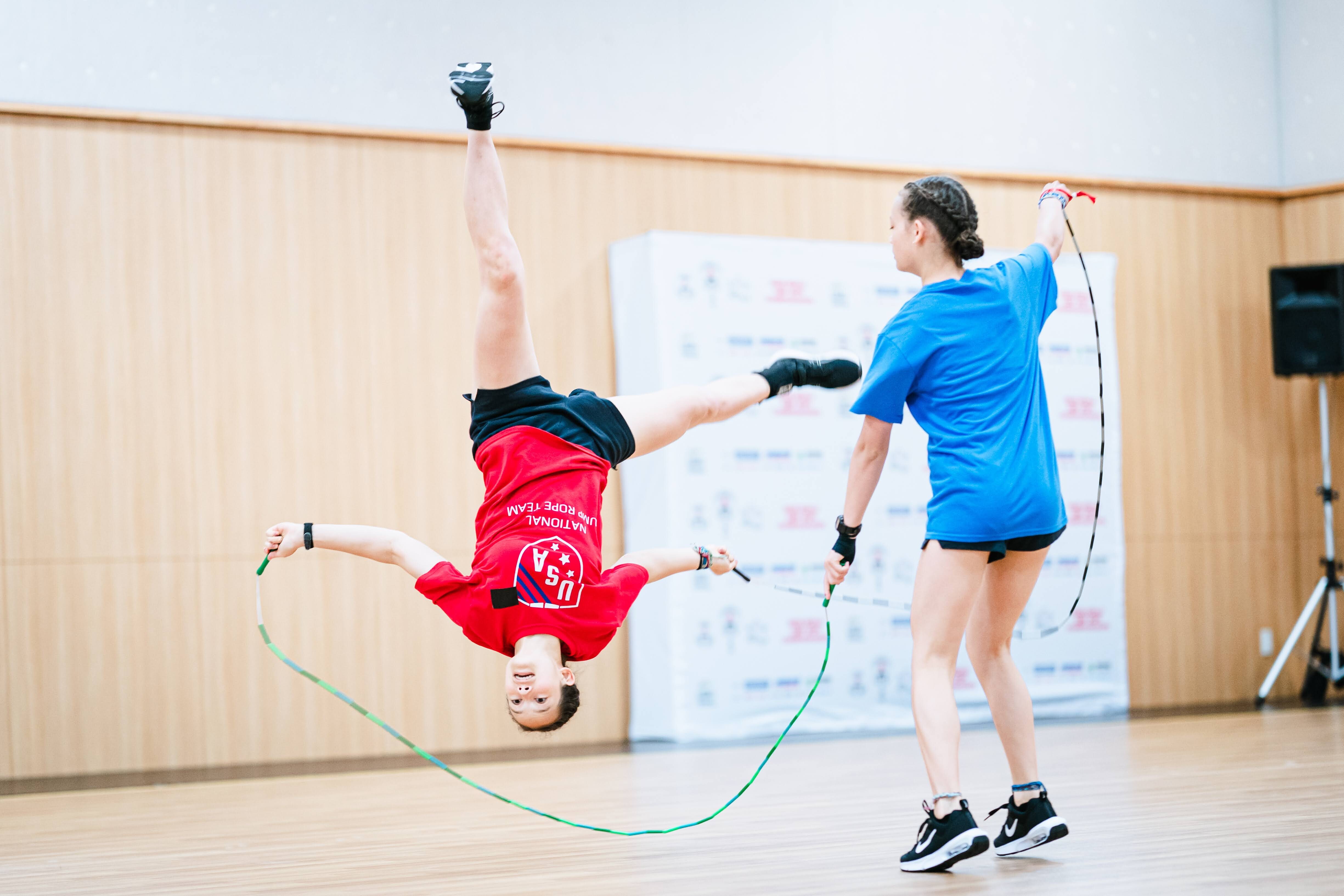 caption: Sisters Madeleine and Mara Garrison perform wheel freestyle at the International Jump Rope Union's World Championships in August 2025.