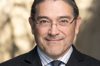 caption: If confirmed by the Senate, Robert Santos, a Latinx statistician shown here in a handout photo from 2019, would be the Census Bureau's first permanent director of color.