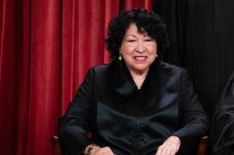 caption: Justice Sonia Sotomayor during the formal group photograph at the Supreme Court on Oct. 7, 2022.