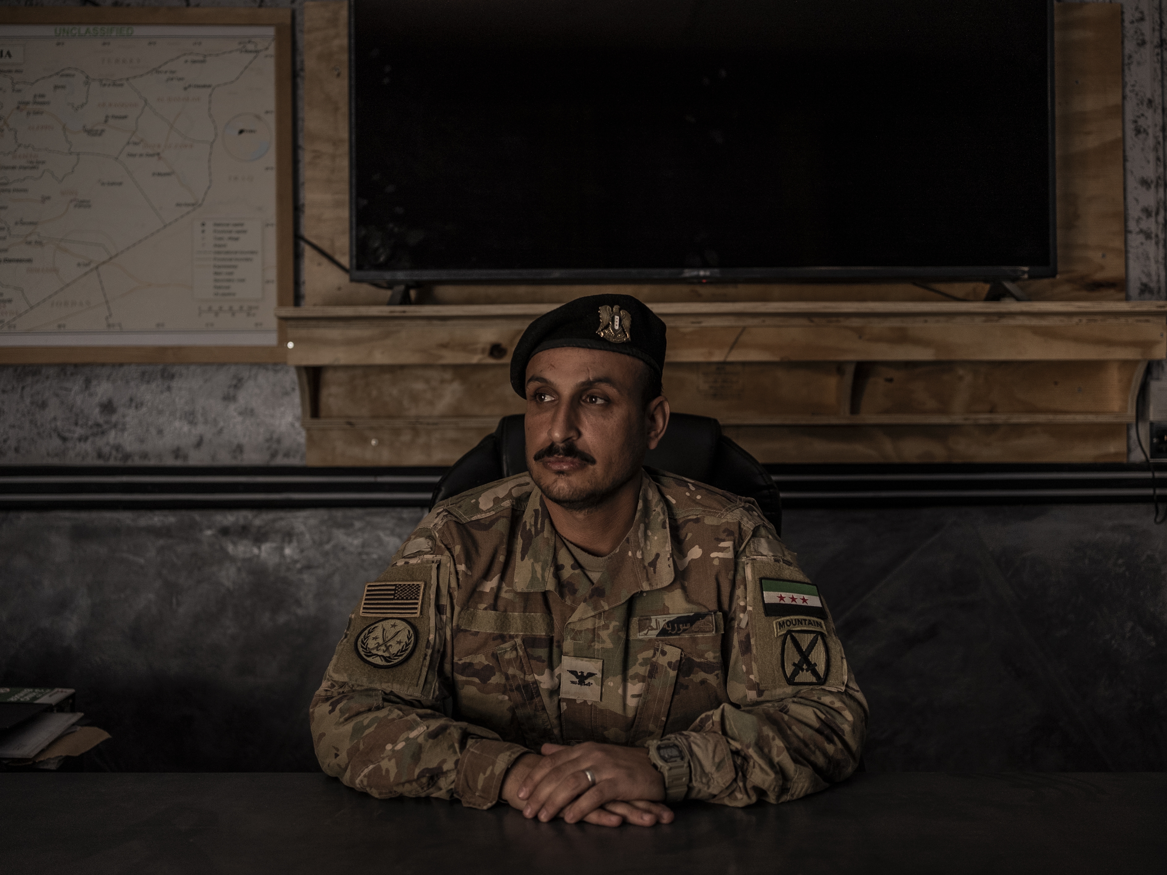 caption: Salim Turki al-Anteri, the commander of the Syrian Free Army, in his office in al-Tanf, Syria, Dec. 14.