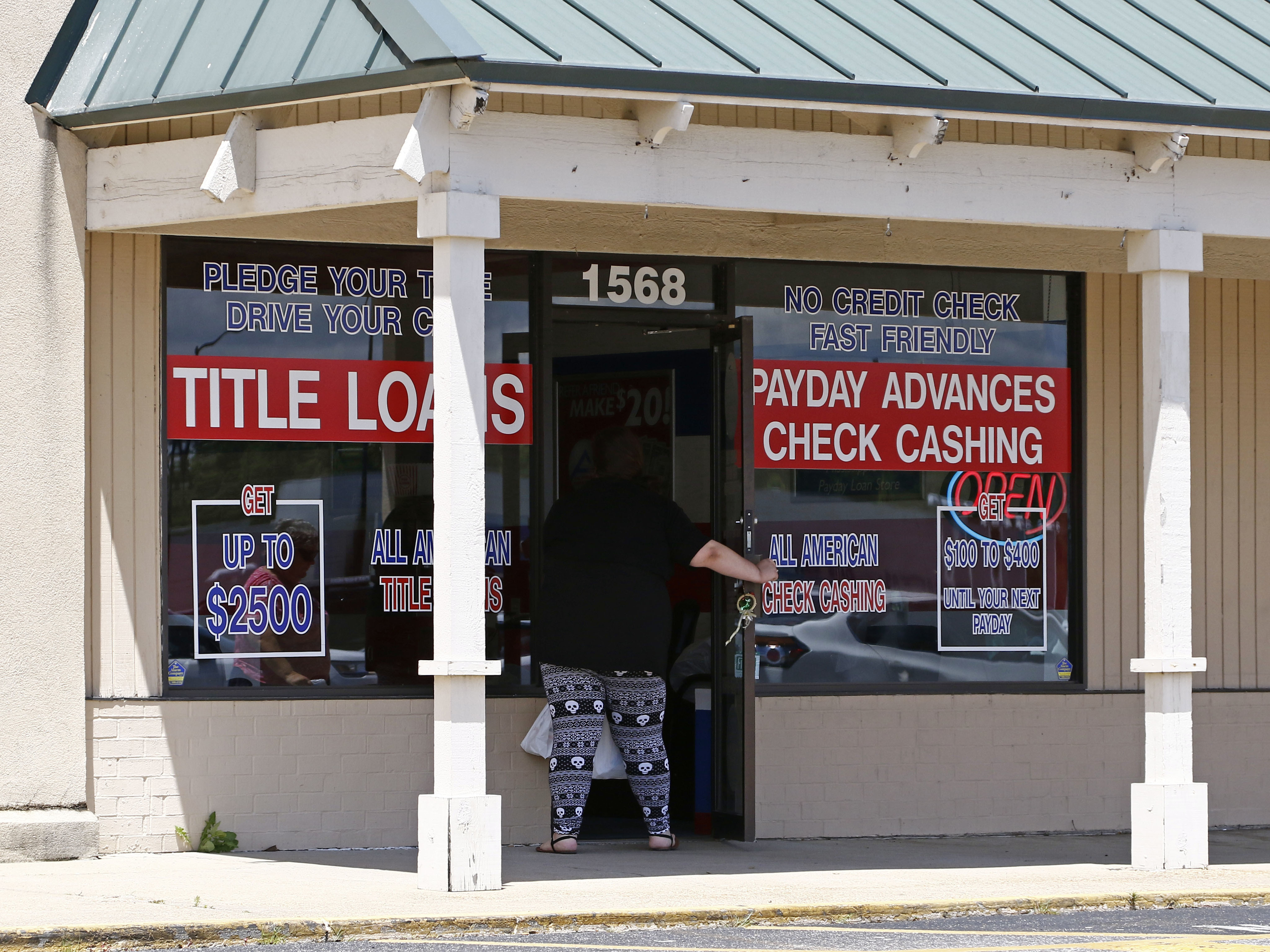 caption: Under President Trump, the Consumer Financial Protection Bureau weakened a rule that aimed to protect people who get payday loans. Consumer advocates say they are looking forward to a Biden administration strengthening the agency.