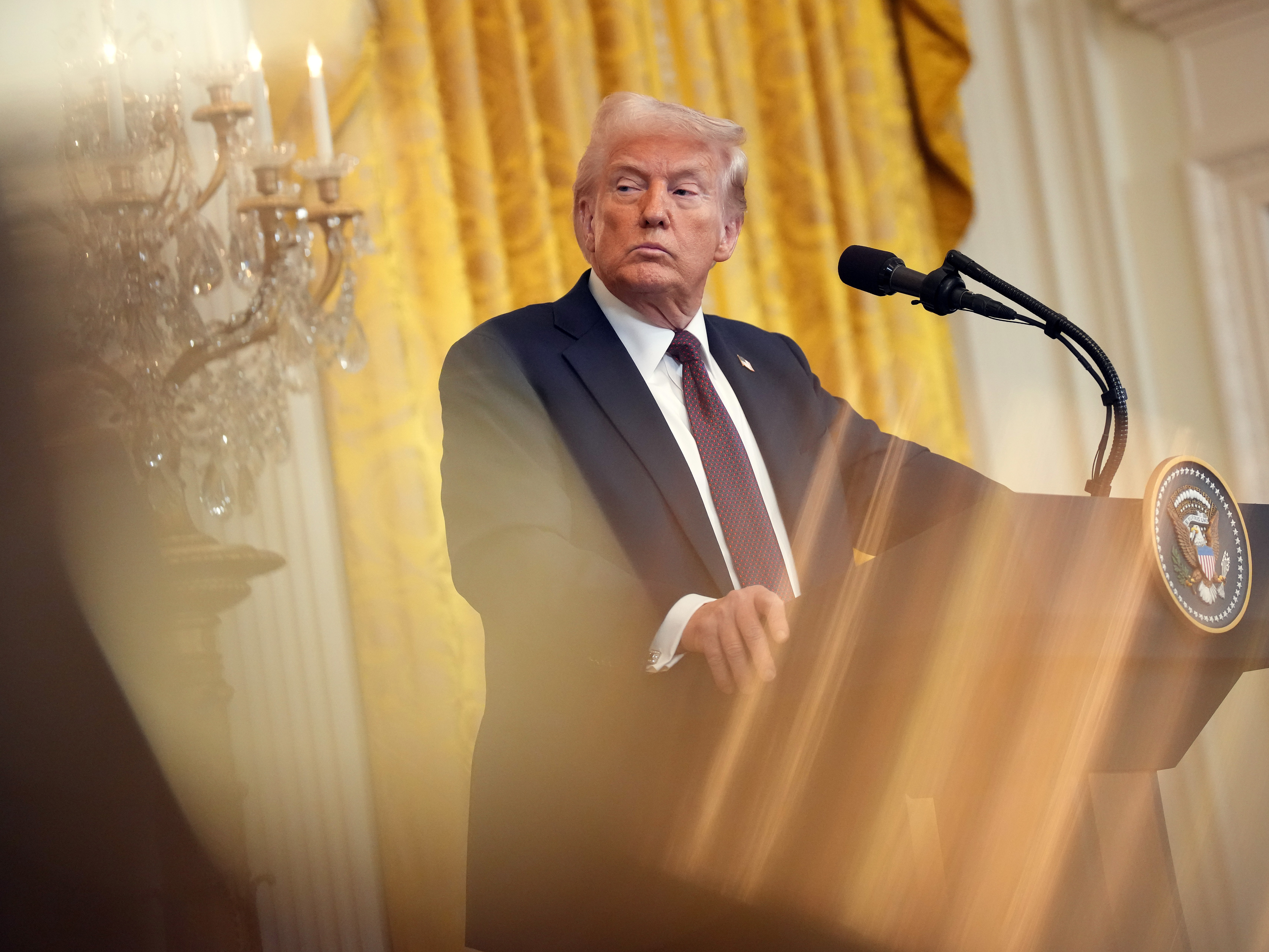 caption: President Trump looks on during a joint press conference with U.K. Prime Minister Keir Starmer in the East Room at the White House on Feb. 27.