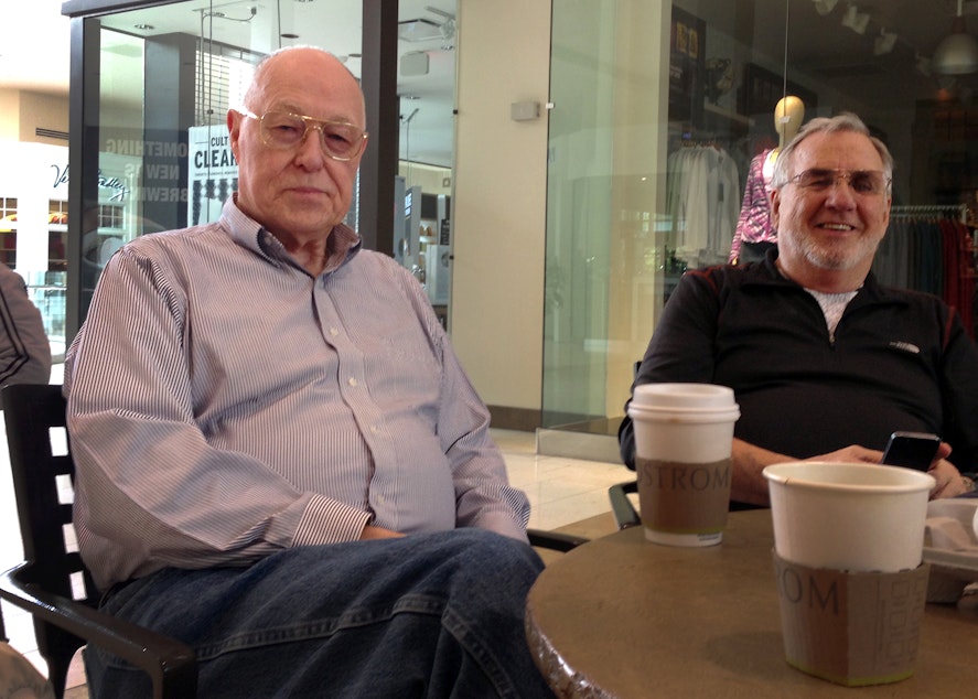 caption: Jon Tucker (left), 76, has been a regular mall walker for 10 years.