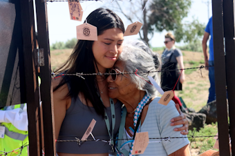 caption: Tae Shimamoto (left) hugs her mother, Tomita Shimamoto (right), who was born at Minidoka prison camp in rural Idaho, where thousands of Japanese Americans were held during World War II.
