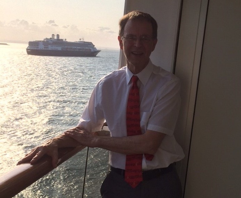 caption: Kim Peterson in his stateroom aboard the Zandaam off Panama City. In the background is another cruise ship, the Rotterdam, which has been taking on healthy passengers from the Zandaam. But Peterson and his wife have not been allowed to transfer over worries about their exposure to the coronavirus.