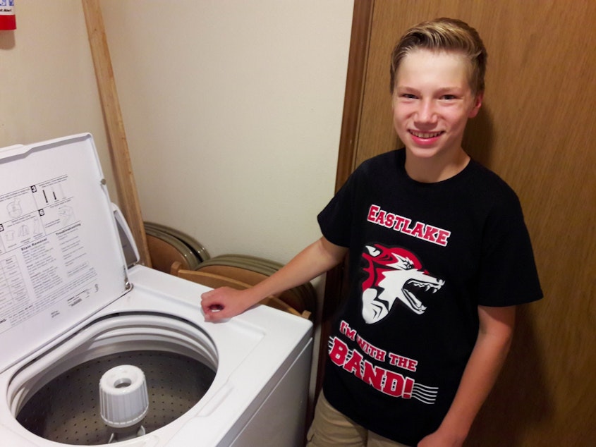 caption: Jonathan Carollo, 14, captured viral attention when he played his washing machine. Now he's part of an international video including child prodigies