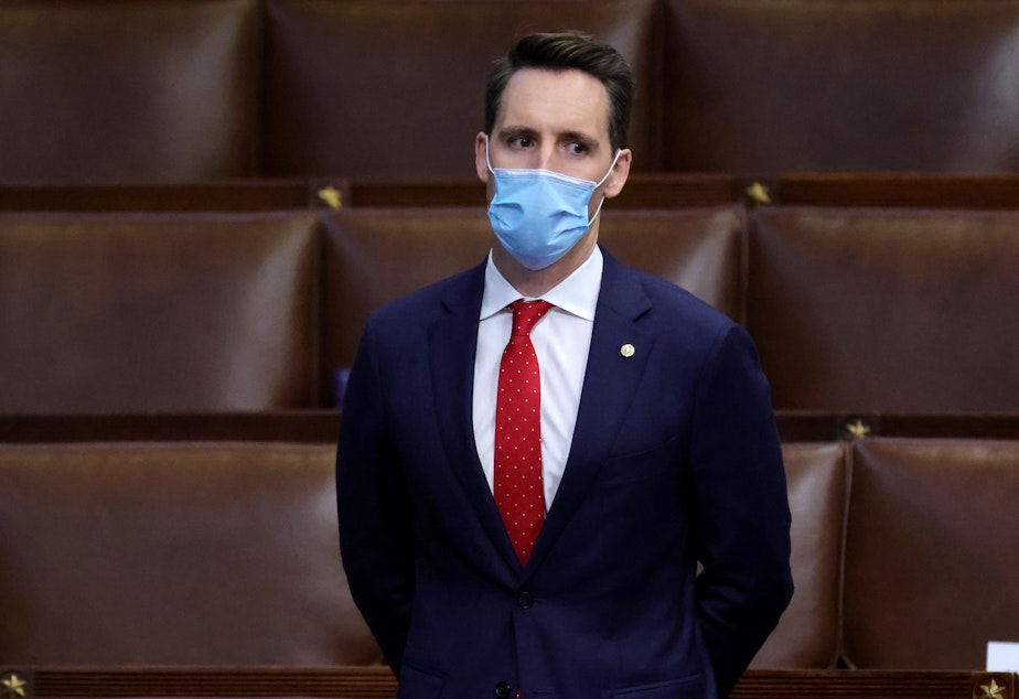 caption: Sen. Josh Hawley, R-Mo., seen here during a reconvening of a joint session of Congress on January 06, has penned an op-ed defending his decision to object to the electoral votes certification.