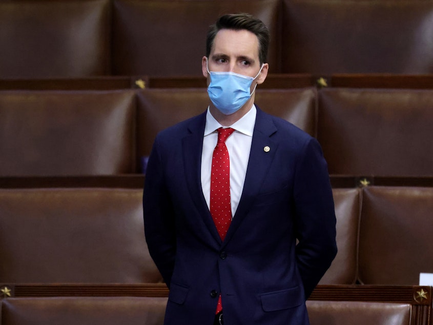 caption: Sen. Josh Hawley, R-Mo., seen here during a reconvening of a joint session of Congress on January 06, has penned an op-ed defending his decision to object to the electoral votes certification.