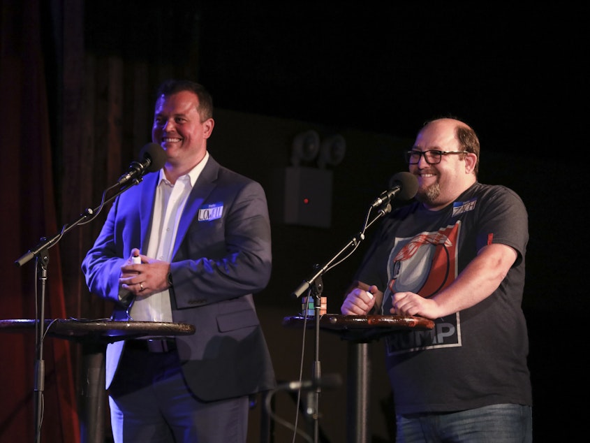 caption: Contestants Lowell Williams and Zach Elwyn appear on<em> Ask Me Another</em> at the Bell House in Brooklyn, New York.