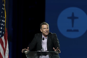 caption: Bruce Frank, chairman of the Southern Baptist Convention's sexual abuse task force, speaks during its annual meeting in Anaheim, Calif., Tuesday, June 14, 2022.