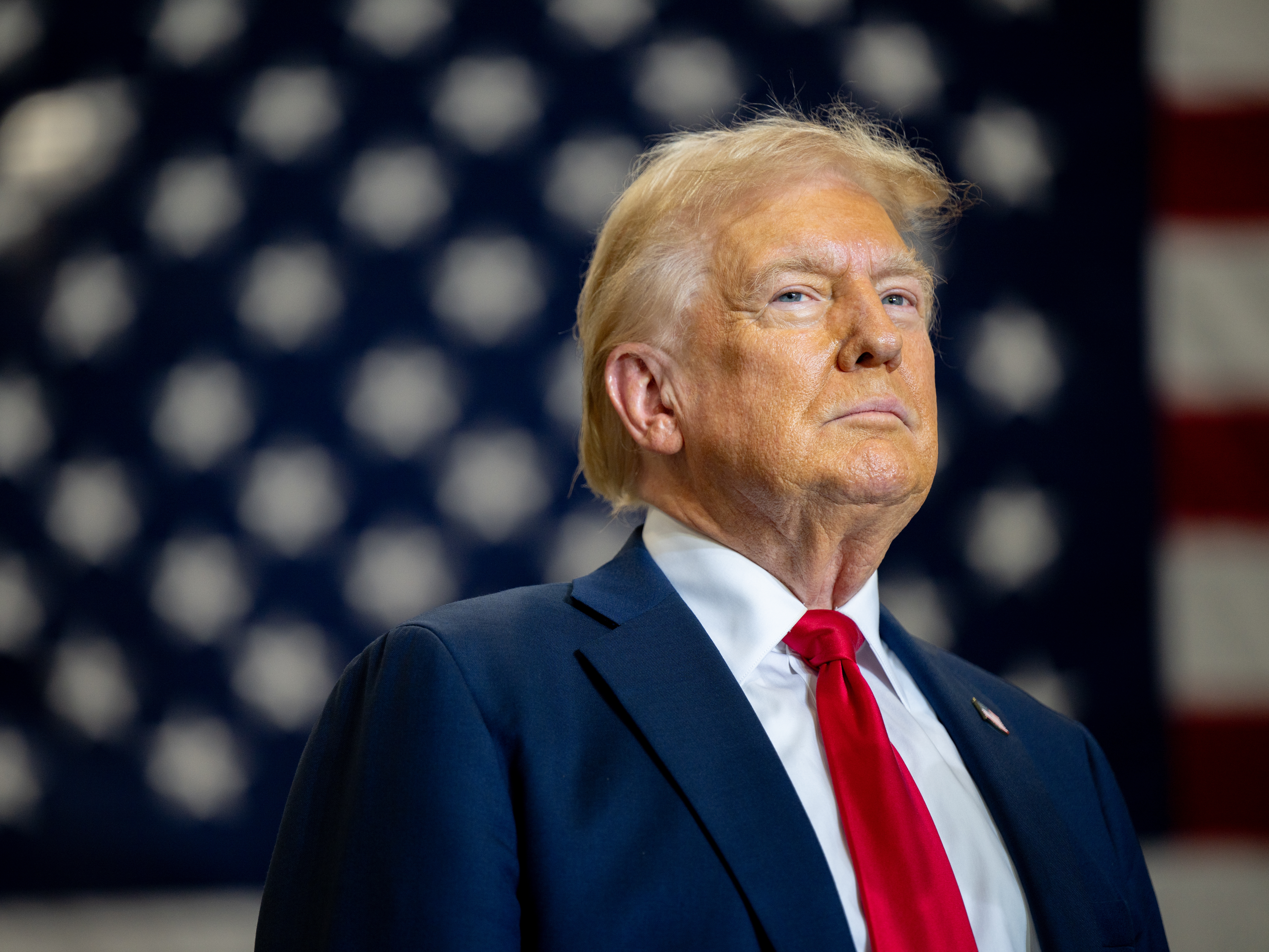 caption: Republican presidential nominee, former President Donald Trump pauses before speaking during a campaign rally on Sept. 25, in Mint Hill, N.C.